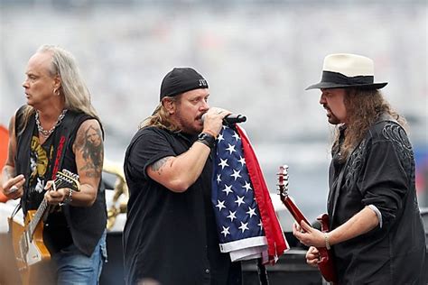 lynyrd skynyrd s move to drop confederate flag stirs debate among fans