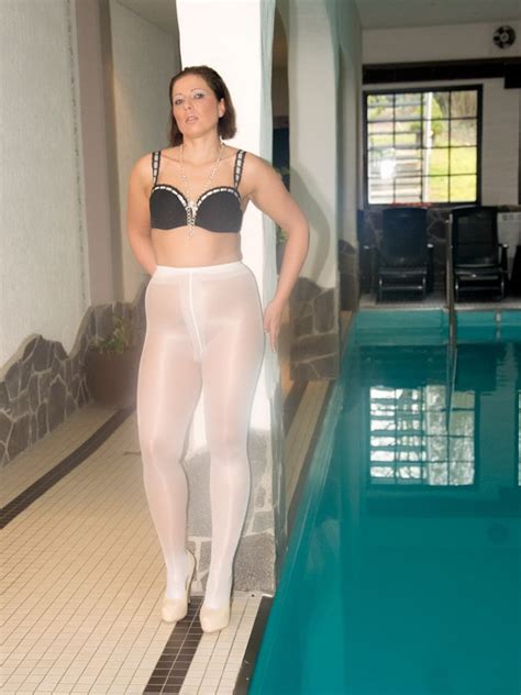 milf jess in white pantyhose and high heels near the water pool