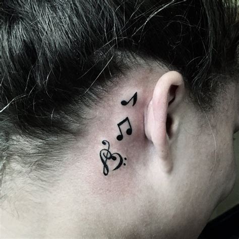 music note tattoo on neck mishkanet