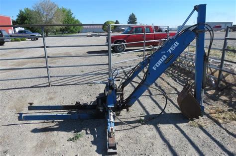 ford  backhoe attachment idaho auction barn