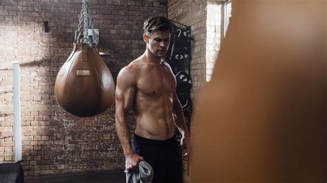 chris hemsworth s trainer says work out less for long term