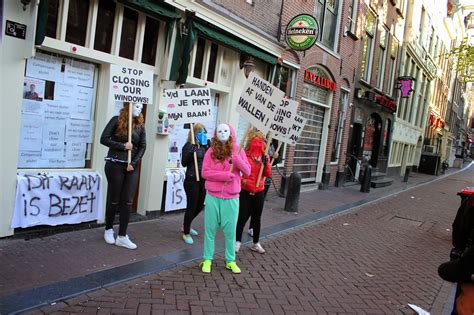 behind the red light district prostitutes occupy closed window brothels
