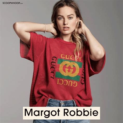 margot robbie or emma mackey we bet you to spot the difference