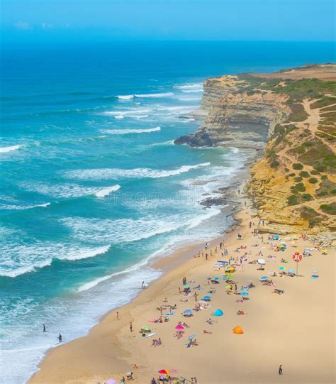 people ocean beach nazare portugal stock photo image  ocean portugal