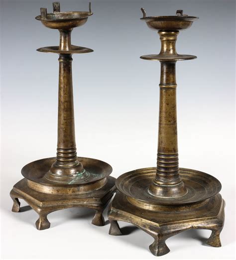 brass footed candlesticks  drip pan
