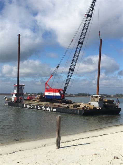 barge moving   position dock supply  construction