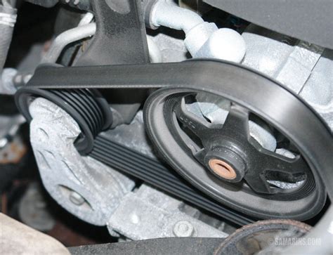 serpentine belt tensioner problems signs  wear   replace noises