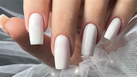viral white nail theory offers  subtle alternative   red mani