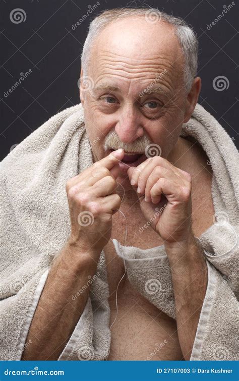man flossing  teeth stock  image