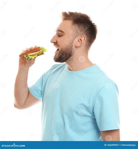 Young Man Eating Tasty Sandwich On White Stock Image Image Of
