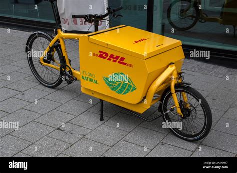 dhl electrical delivery bicycle  amsterdam  netherlands  stock photo alamy