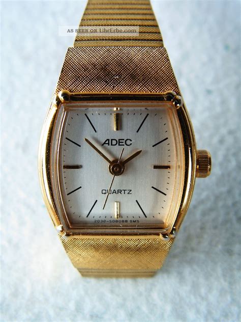 armbanduhr der marke adec mit goldenem metallarmband damenuhr retro