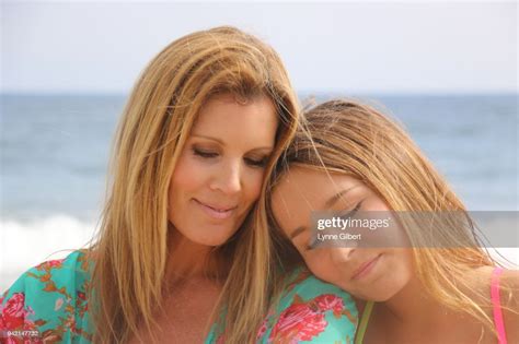 Beautiful Mother And Daughter Bond On The Beach In Malibu California