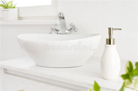 hand washing concept  soap dispenser  washstand  bathroom stock