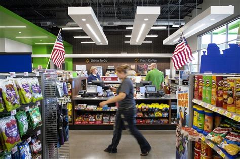 wal mart   grow  embracing smaller stores wsj