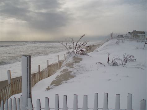 visit  snow covered beach beach  beautiful beach scenes winter pictures