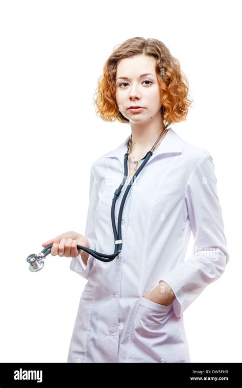Cute Redhead Doctor In Lab Coat With Stethoscope Isolated On White