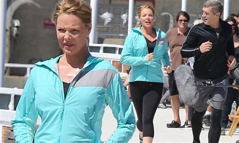 katherine heigl covers up her growing bump to film action scenes for new show doubt daily mail