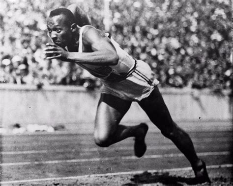 jesse owens wins the 100 meter dash at berlin olympics in