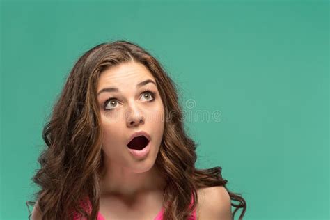 Portrait Of Young Woman With Shocked Facial Expression Stock Image