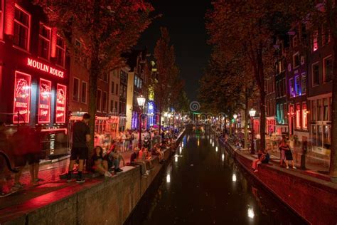 amsterdam nightlife  netherlands editorial photography image  pedestrian intersection