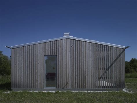 small swedish house   boards  corrugated metal