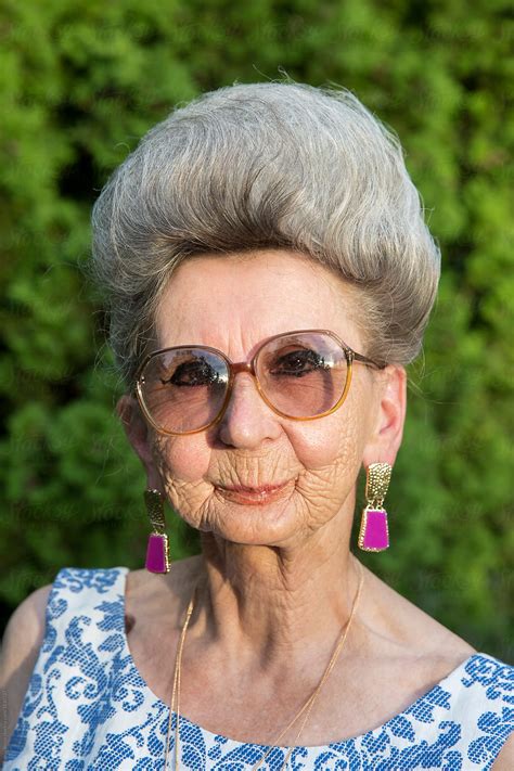 Portrait Of An Over 70 Years Old Woman Wearing Glasses