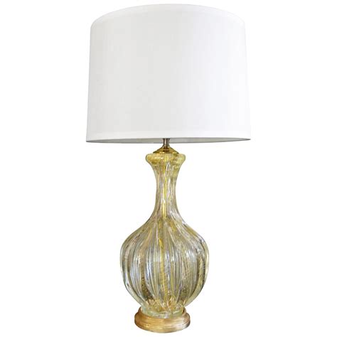 A Shimmering Murano Mid Century Clear Glass Ribbed Lamp With Controlled