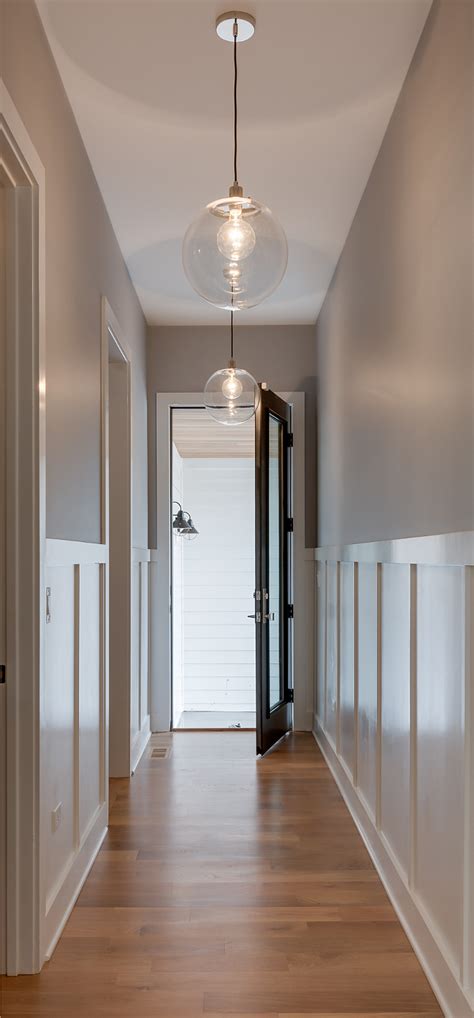 White Farmhouse with Wrap-Around Porch - Home Bunch