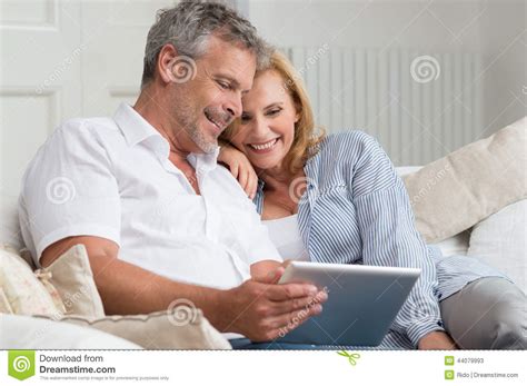 happy mature couple with tablet stock image image of female communication 44079993