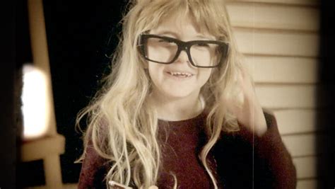 A Cute Little Blonde Girl With Nerdy Glasses Is Royalty