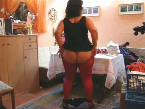 chubby slut in red pantyhose shakes her fat ass video