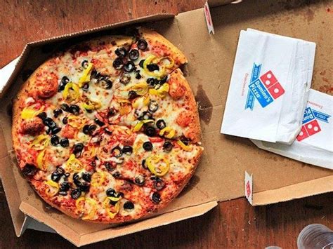 dominos teams  large pizza  eats pizza