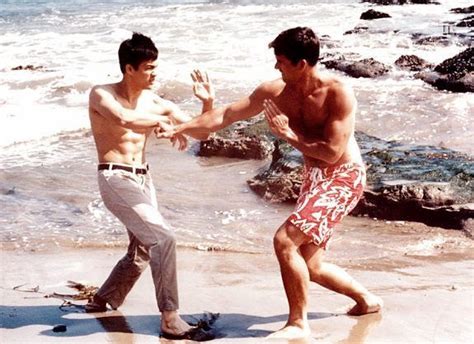 bruce working out on the beach with van williams bruce lee bruce lee photos bruce lee