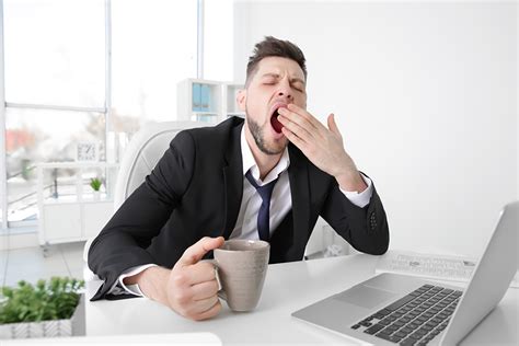 tired business man yawning  workplace  office great living today