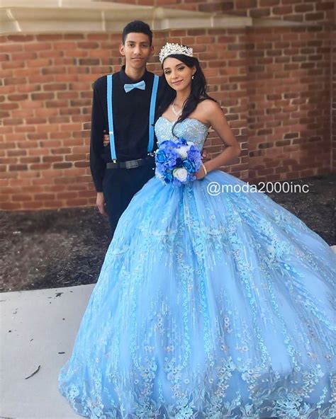 main chambelan  quinceanera moment wearing cute baby blue quince dresses quinceanera