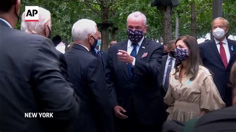 pence biden greet with elbow bump at ceremony
