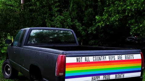 oklahoma man supports lgbtq pride with duct tape pride flag on truck