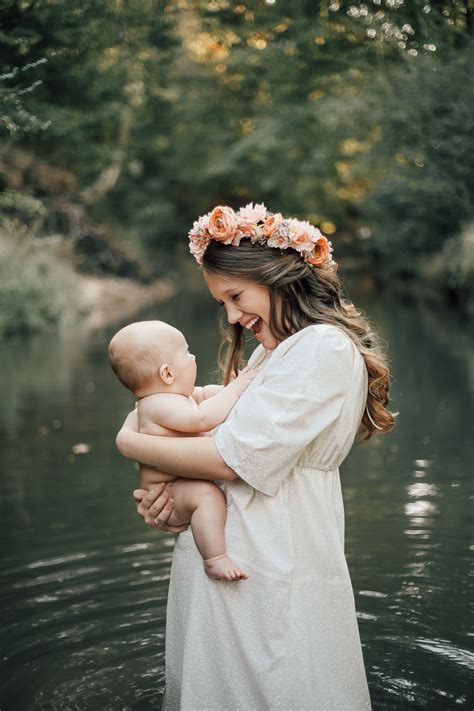 An Intimate Breastfeeding Session In The Creek The Bond Between Mother