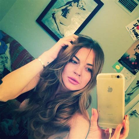 lilo s topless selfie overshadowed by completely nude pic behind her