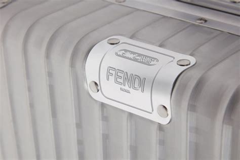fendi teams up with premium luggage maker rimowa for an