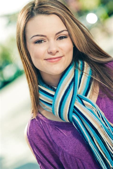 Beautiful Woman Wearing A Blue Scarf Outdoors Royalty Free