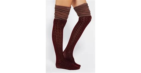 urban outfitters pointelle scrunch over the knee socks in red lyst