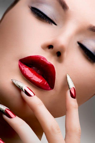 sexy beauty girl with red lips and nails provocative