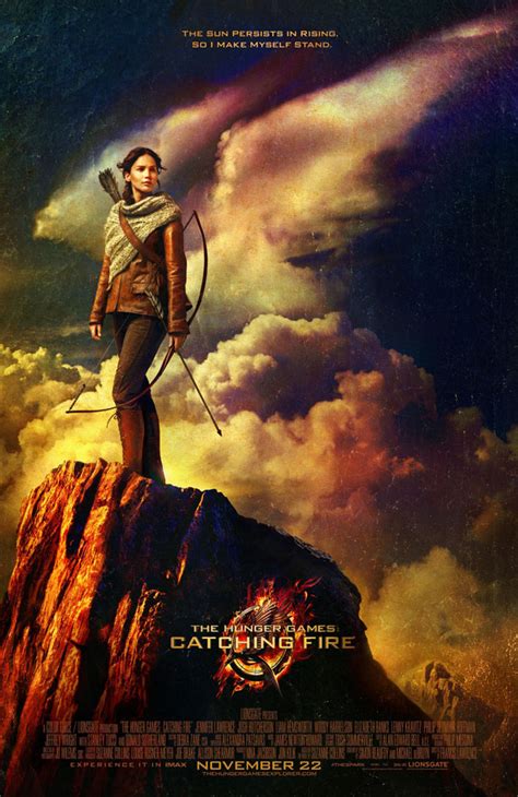 hunger games catching fire poster it s a 70s pulp