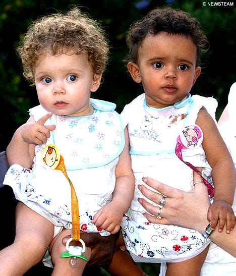 million to one black and white twins celebrate first