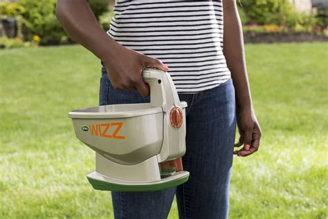 scotts wizz hand held spreader  fertilizer soil spreaders