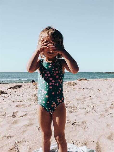 australian beach day via e v e r o s e in seaesta surf girls swimsuit