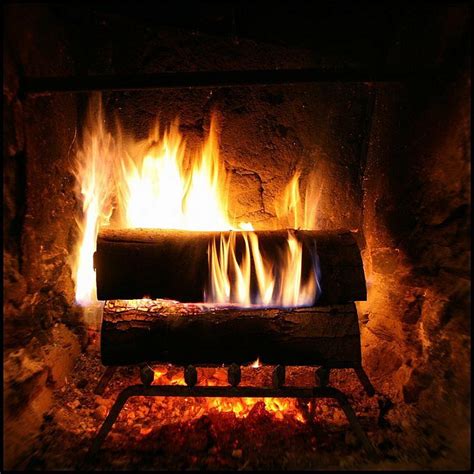 crackling fireplace stone fireplace fireplace photography fireplace