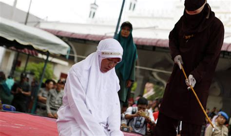 horrifying moment woman is lashed under sharia law for speaking to man